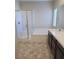 Bathroom with a separate shower and soaking tub and double vanity at 806 Star Estates Ave, North Las Vegas, NV 89086