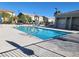 Enjoy the community pool with ample seating and shade structures, perfect for relaxation and recreation at 806 Star Estates Ave, North Las Vegas, NV 89086