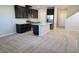 Spacious kitchen featuring stainless steel appliances and a center island with a sink at 806 Star Estates Ave, North Las Vegas, NV 89086