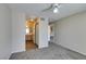Carpeted bedroom view with access to bathroom and other rooms at 8070 W Russell Rd # 2121, Las Vegas, NV 89113