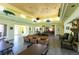 Bright clubhouse area showcases inviting seating, fireplace, and views to the exterior at 8070 W Russell Rd # 2121, Las Vegas, NV 89113