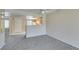 Comfortable living room with an open view to the kitchen, adjacent to the entrance at 8070 W Russell Rd # 2121, Las Vegas, NV 89113