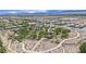 An aerial view of the community featuring a desert landscape, neighborhood park, and walking trail at 8134 Maddingley Ave, Las Vegas, NV 89117