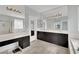 Beautiful bathroom with dual vanity, granite countertop, and natural light at 8134 Maddingley Ave, Las Vegas, NV 89117
