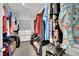 Walk-in closet featuring built-in shelving and storage, and clothing racks at 8134 Maddingley Ave, Las Vegas, NV 89117