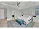 Relaxing main bedroom features a large bed, stylish decor, and ensuite bathroom access at 8134 Maddingley Ave, Las Vegas, NV 89117