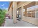 Covered patio featuring stucco columns and access to backyard landscaping at 8134 Maddingley Ave, Las Vegas, NV 89117