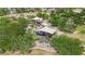 Community playground featuring covered play structures, mature trees, and walking paths at 8134 Maddingley Ave, Las Vegas, NV 89117
