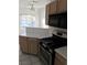 Kitchen featuring oven, cooktop, microwave, and stainless steel appliances at 9000 Las Vegas Blvd # 2013, Las Vegas, NV 89123