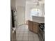 Tile flooring, stainless steel refrigerator, and access to adjacent dining area at 9000 Las Vegas Blvd # 2033, Las Vegas, NV 89123