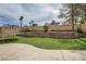This backyard's artificial turf and elevated planter offer low maintenance outdoor enjoyment at 901 Clipper Dr, Henderson, NV 89015