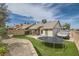 This backyard includes low-maintenance artificial turf, and a large trampoline at 901 Clipper Dr, Henderson, NV 89015