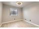 Bedroom featuring tile flooring, a ceiling fan, and a window at 901 Clipper Dr, Henderson, NV 89015