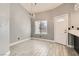 Well-lit dining room featuring chandelier lighting and a door to the exterior at 901 Clipper Dr, Henderson, NV 89015