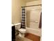 Neat bathroom featuring a tub and shower combination and dark hardware at 9133 Forest Willow Ave # 102, Las Vegas, NV 89149