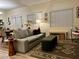Well-lit living room featuring cozy seating and stylish decor at 9133 Forest Willow Ave # 102, Las Vegas, NV 89149