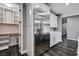 Updated kitchen features a stainless steel refrigerator and walk-in pantry at 9638 Smiley Creek St, Las Vegas, NV 89178