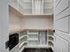 Walk-in pantry with built-in shelving, cabinets, and pull-out basket storage at 9638 Smiley Creek St, Las Vegas, NV 89178