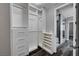 Spacious walk-in closet with custom shelving, drawers, and ample storage space at 9638 Smiley Creek St, Las Vegas, NV 89178