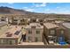 An aerial shot of multiple homes in a new neighborhood with solar panels on their roofs at 9715 Harper Edge St, Las Vegas, NV 89143