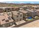 Aerial view of a neighborhood featuring desert landscaping and solar panels at 9715 Harper Edge St, Las Vegas, NV 89143