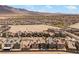 Planned residential community with a desert landscape in the background and new home construction at 9715 Harper Edge St, Las Vegas, NV 89143