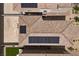 Birds-eye view of a home with solar panels on roof and a small grass yard at 9715 Harper Edge St, Las Vegas, NV 89143