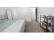 Bedroom featuring sliding closet doors, neutral carpet, and a small organization shelf at 9715 Harper Edge St, Las Vegas, NV 89143