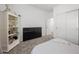 Bright bedroom with white walls, plush carpet, and a closet with sliding doors at 9715 Harper Edge St, Las Vegas, NV 89143