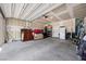 A two-car garage with lots of storage space, perfect for hobbies and vehicles at 9715 Harper Edge St, Las Vegas, NV 89143