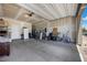 Two-car garage featuring overhead lighting, perfect for storage and organization at 9715 Harper Edge St, Las Vegas, NV 89143