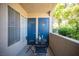 Outdoor balcony with seating area, offering a relaxing space with natural light at 10245 S Maryland Pkwy # 106, Las Vegas, NV 89183