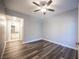 Spacious bedroom showing the ensuite bathroom and hall to another room at 10245 S Maryland Pkwy # 106, Las Vegas, NV 89183