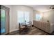 Intimate dining area with warm lighting, views of the outdoors, and a comfortable setting for meals at 10245 S Maryland Pkwy # 106, Las Vegas, NV 89183