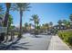 Gated community entrance with lush landscaping creates a secure, welcoming atmosphere at 10245 S Maryland Pkwy # 106, Las Vegas, NV 89183
