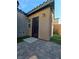 View of a patio featuring interlocking pavers and private access into the home at 1050 Spotted Saddle St, Henderson, NV 89015