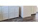 Stylish bedroom features built-in storage cabinets and modern wood-style flooring at 1050 Spotted Saddle St, Henderson, NV 89015