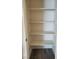 A well-organized closet space is shown, featuring clean, white shelving at 1050 Spotted Saddle St, Henderson, NV 89015
