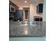 Modern kitchen with stainless steel appliances and granite countertops at 1050 Spotted Saddle St, Henderson, NV 89015