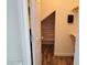 Charming walk-in closet features wood-style flooring and built-in shelving for optimal storage solutions at 1050 Spotted Saddle St, Henderson, NV 89015