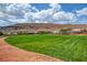 Well-maintained baseball field set against a backdrop of desert hills perfect for community sports and recreation at 10693 Harvest Green Way, Las Vegas, NV 89135