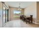 Bright dining area with sliding door and backyard views at 10693 Harvest Green Way, Las Vegas, NV 89135