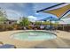 Residents can enjoy a private hot tub area with shaded seating and lounge chairs at 10693 Harvest Green Way, Las Vegas, NV 89135