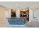 Kitchen features dark wood cabinets, granite counters, and stainless appliances at 10693 Harvest Green Way, Las Vegas, NV 89135