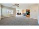 Open floorplan showcases living room flowing into kitchen and dining areas at 10693 Harvest Green Way, Las Vegas, NV 89135