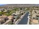 An aerial photograph of the neighborhood highlighting the modern architecture and community amenities at 10895 Artesano Ave, Las Vegas, NV 89135