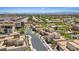 Aerial view of new homes in community near city with mountain backdrop at 10895 Artesano Ave, Las Vegas, NV 89135