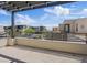 Balcony view featuring an architectural pergola and views of the surrounding community at 10895 Artesano Ave, Las Vegas, NV 89135