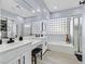 Bathroom featuring double sinks, soaking tub, and shower at 11 Feather Sound Dr, Henderson, NV 89052