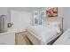 Bedroom with a sliding door closet and large window for natural light at 11 Feather Sound Dr, Henderson, NV 89052